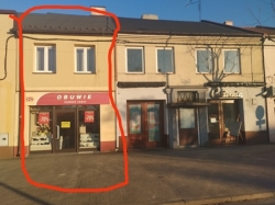 Sprzedam mieszkanie z lokalem handlowo-usugowym .